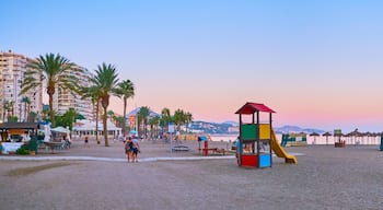 Panorama of Malagueta beach with playground, Malaga, Spain