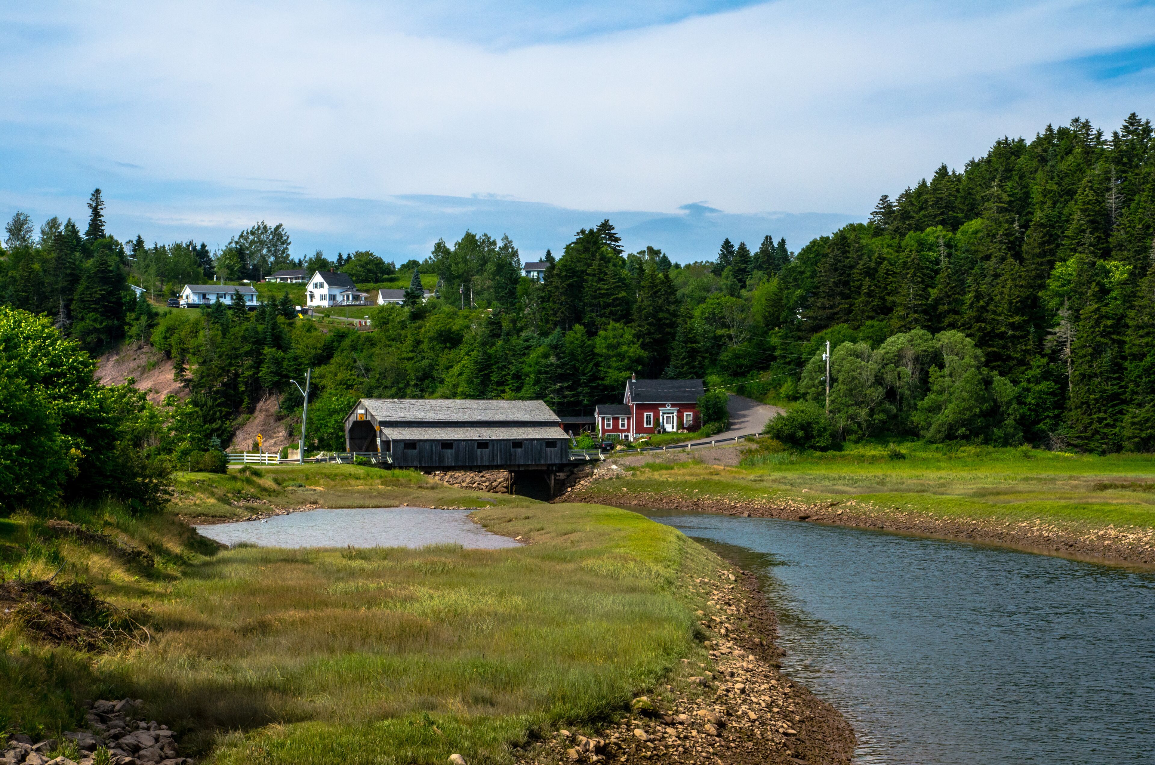 Covered wooden bridge of St. Martins village - N-B