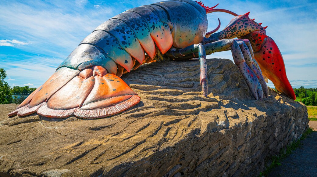 Artificial lobster on the rock in the beach