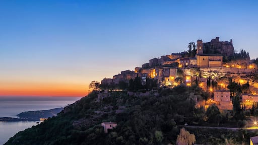 Panoramic view of medieval hilltop village Eze at dusk, Alpes-Maritimes, France