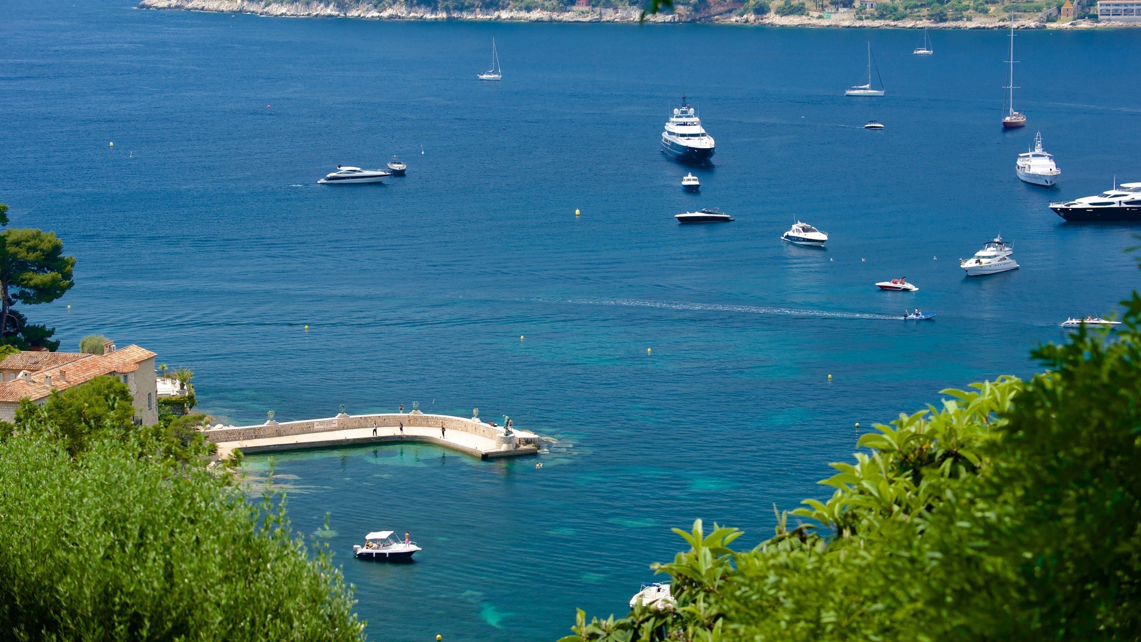 Monaco which includes a bay or harbor and general coastal views