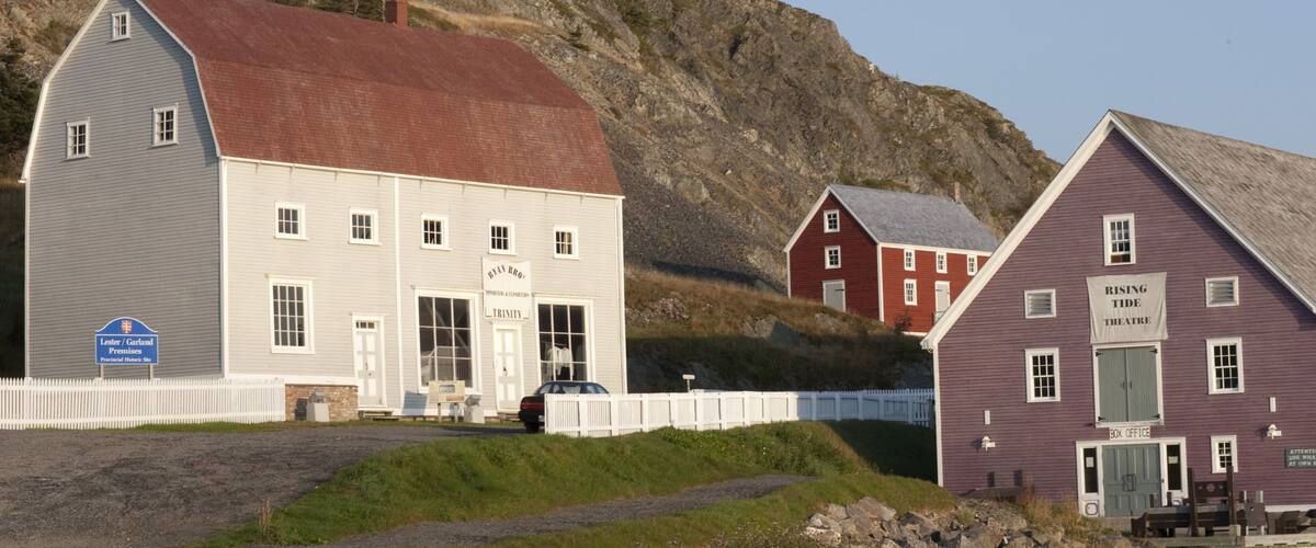 A historic building with a sign reading "Lester/Garland Promises Provincial Historic Site."