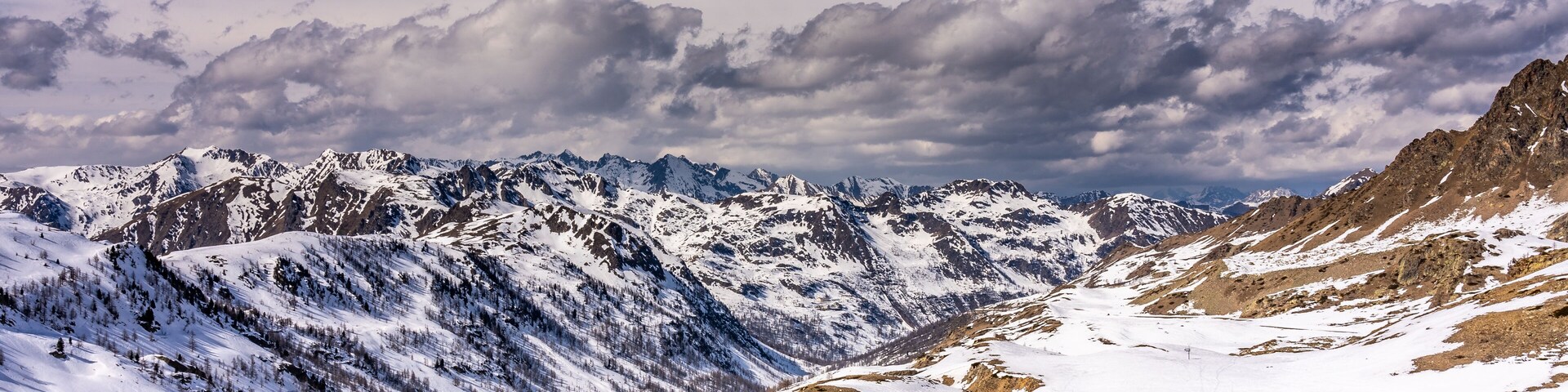 snowy mountains panorama in ski resort isola 2000, france