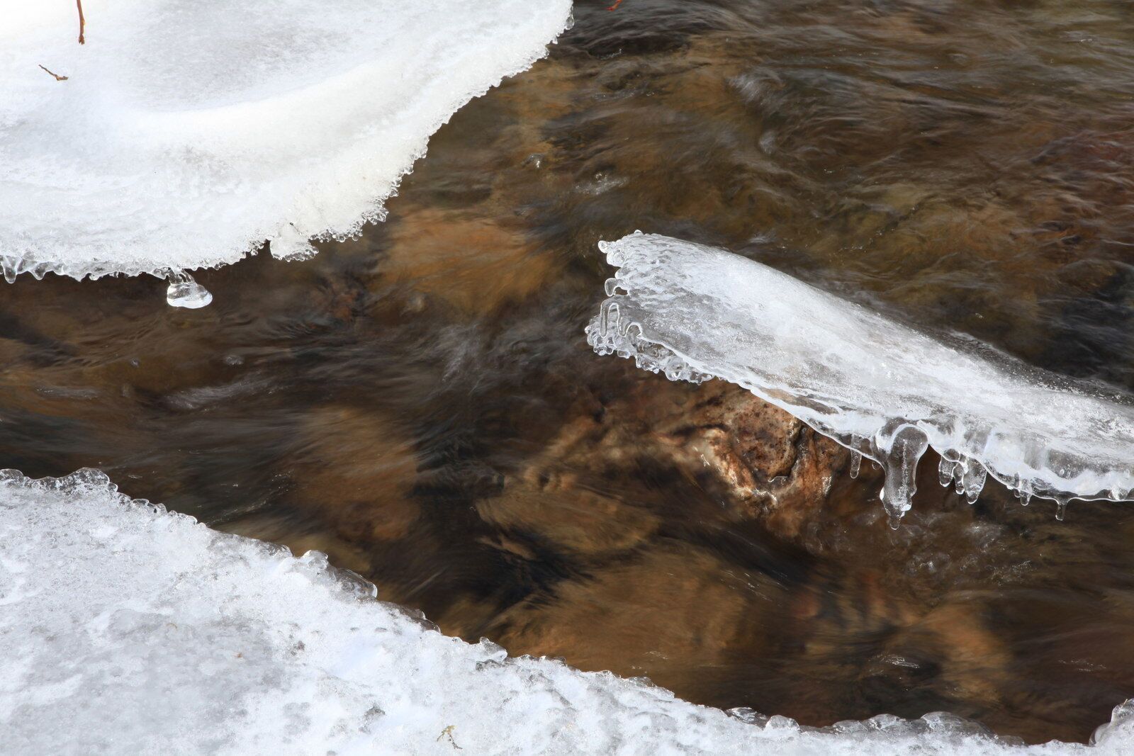 A Frozen Allt Ghlinn Thaitneach This wee burn is a tributary of the Shee Water and begins its journey at Loch nan Eun, a well known fishing loch situated 790 metres above sea level.