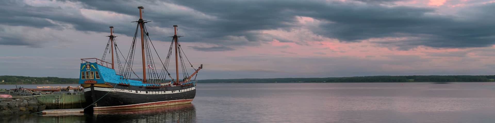 Ship Hector replica at sunset in Pictou, Nova Scotia