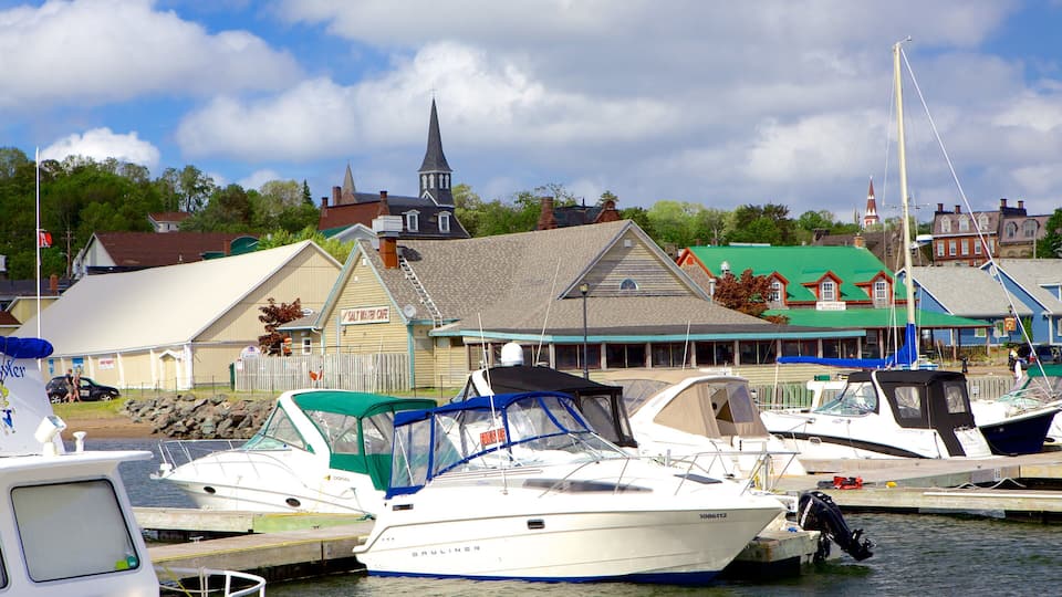 A marina with several boats docked, a church with a steeple, and a building labeled 'Salt Water Cafe'.