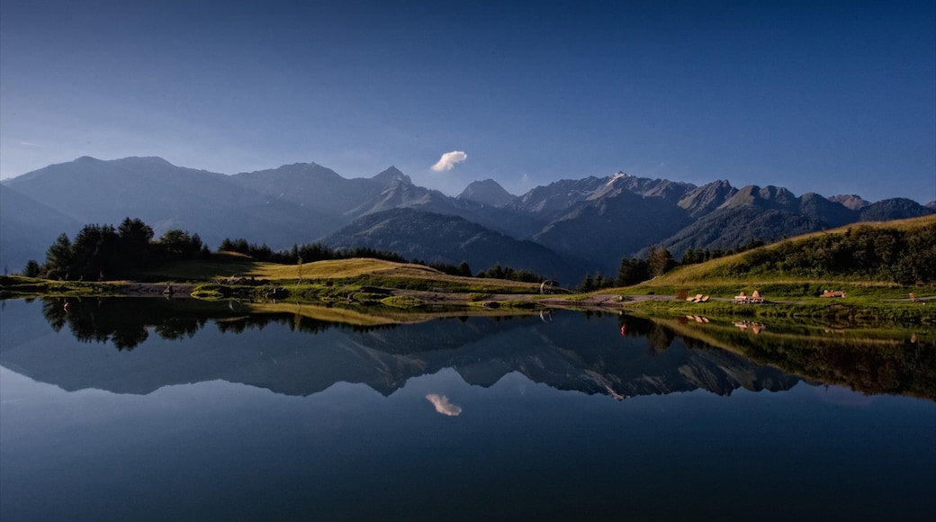 Serfaus which includes a lake or waterhole and mountains