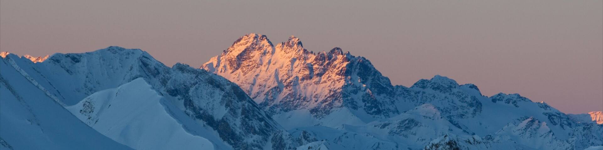 Serfaus featuring snow, mountains and a sunset