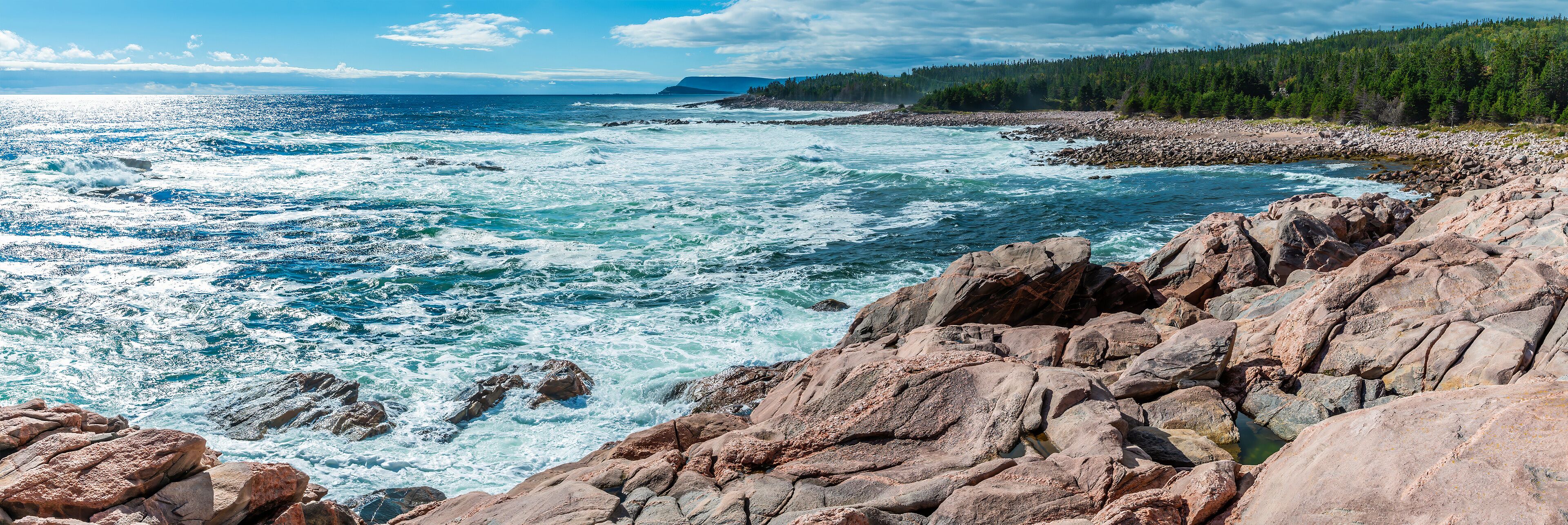 A panorama view along the coast at Green cove, Ingonish on the Cabot Trail Nova Scotia, Canada in the fall
