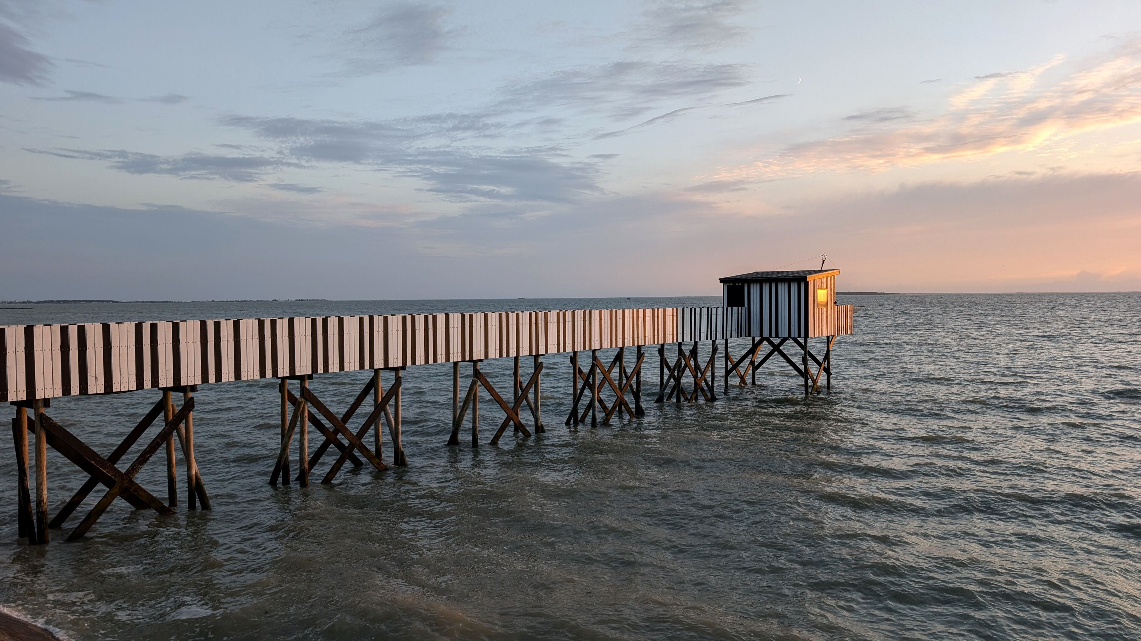 Wooden fishing hut at sunset in Chatelaillon-Plage, France