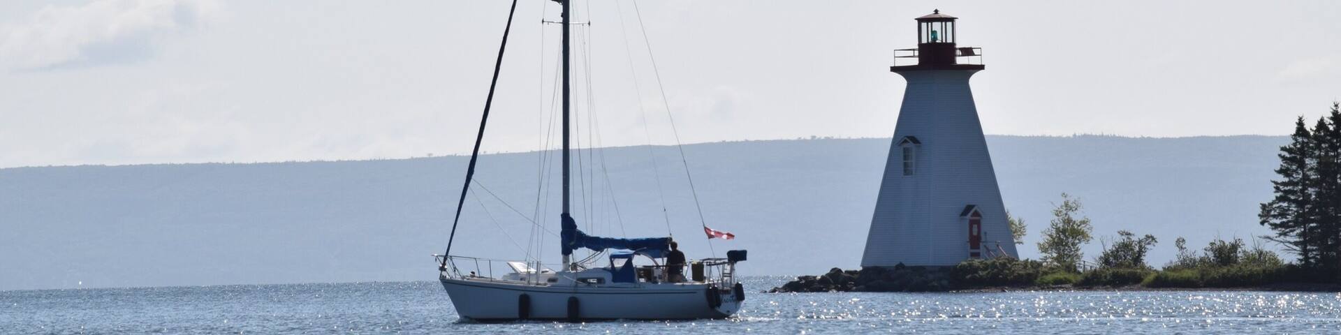 Kids ton Lighthouse at Baddeck