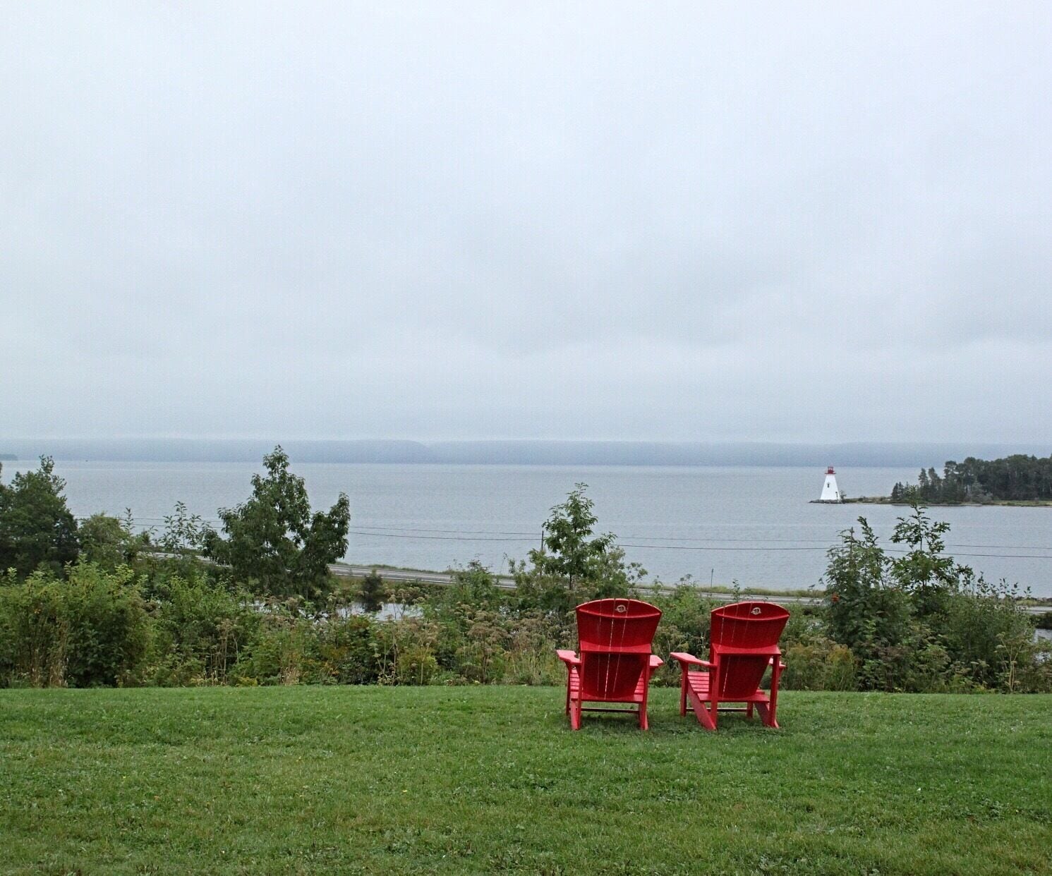 Road trip around Nova Scotia and stop at all the places with #red chairs and enjoy the amazing scenery, you can hike, birdwatching, whale watching or just relax #Red Photo Sweepstakes 