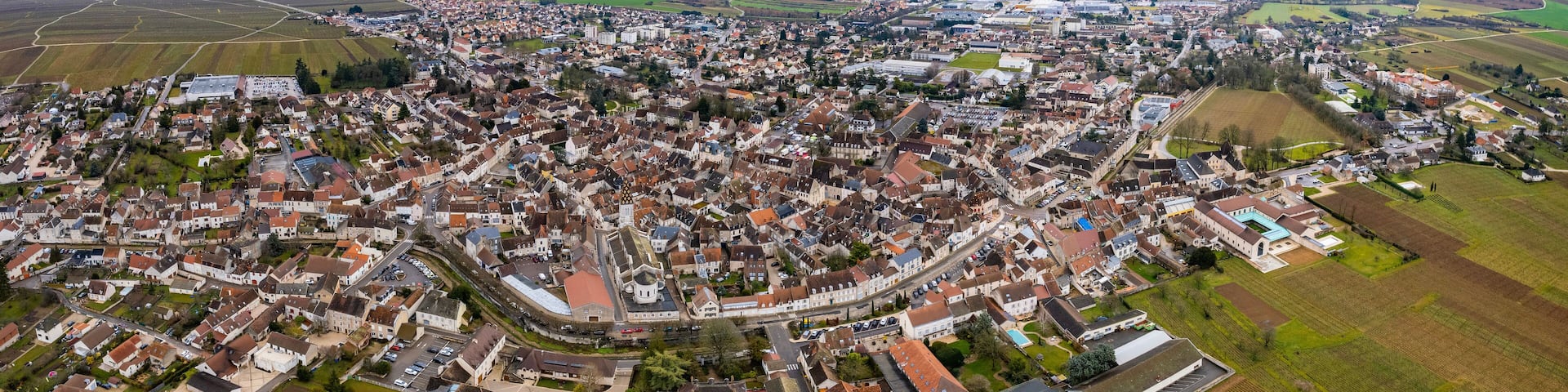 Aerial panorama view of the city Nuits-Saint-Georges in France on a sunny autumn day