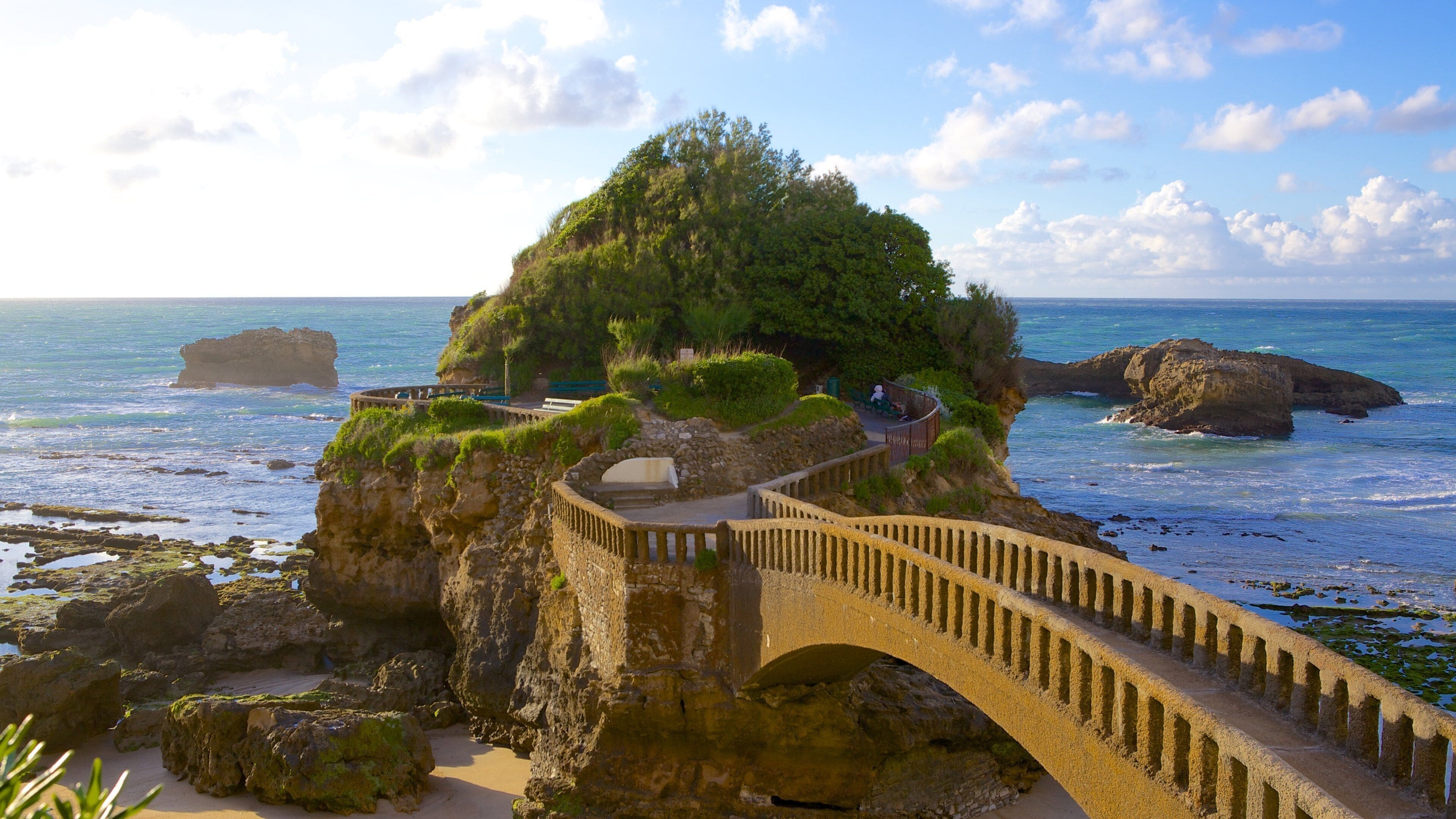Biarritz which includes a bridge, heritage architecture and rugged coastline