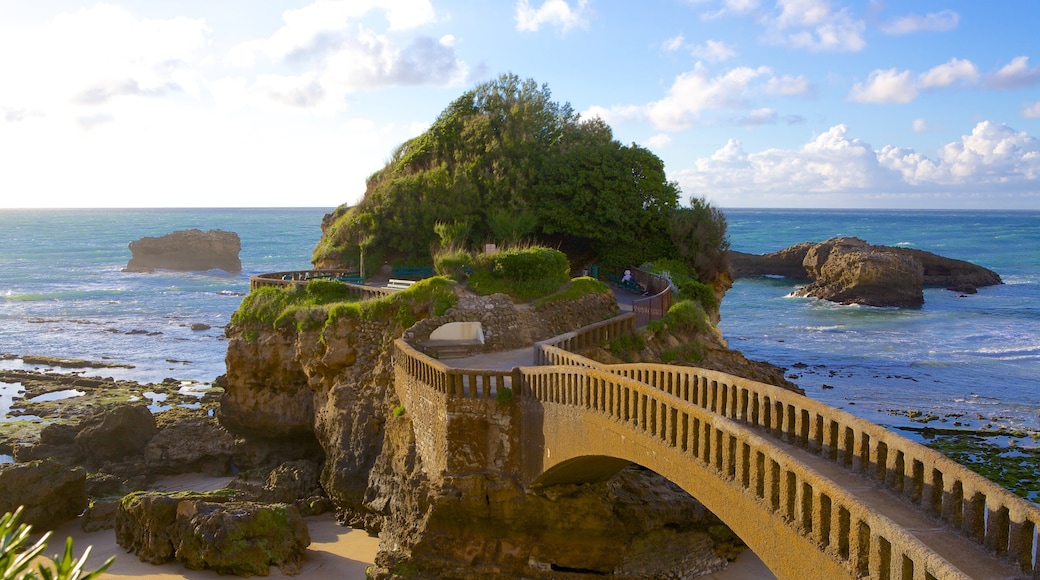 Biarritz which includes a bridge, heritage architecture and rugged coastline