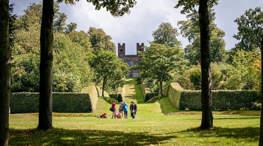 Landscaped vista with Belvedere Tower, at the end of it, Claremont Landscape Garden, Esher, Surrey, UK