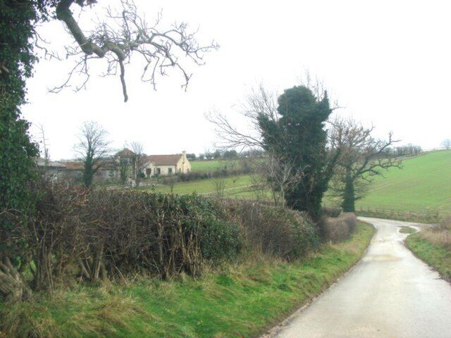 Road from West Woods farm, with Lane side Farm in the background