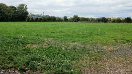 Field adjacent to A4042 roundabout, Croesyceiliog A field viewed from the short unnamed road leading from the A4042 roundabout towards the Edlogan Way / Chapel Lane roundabout.