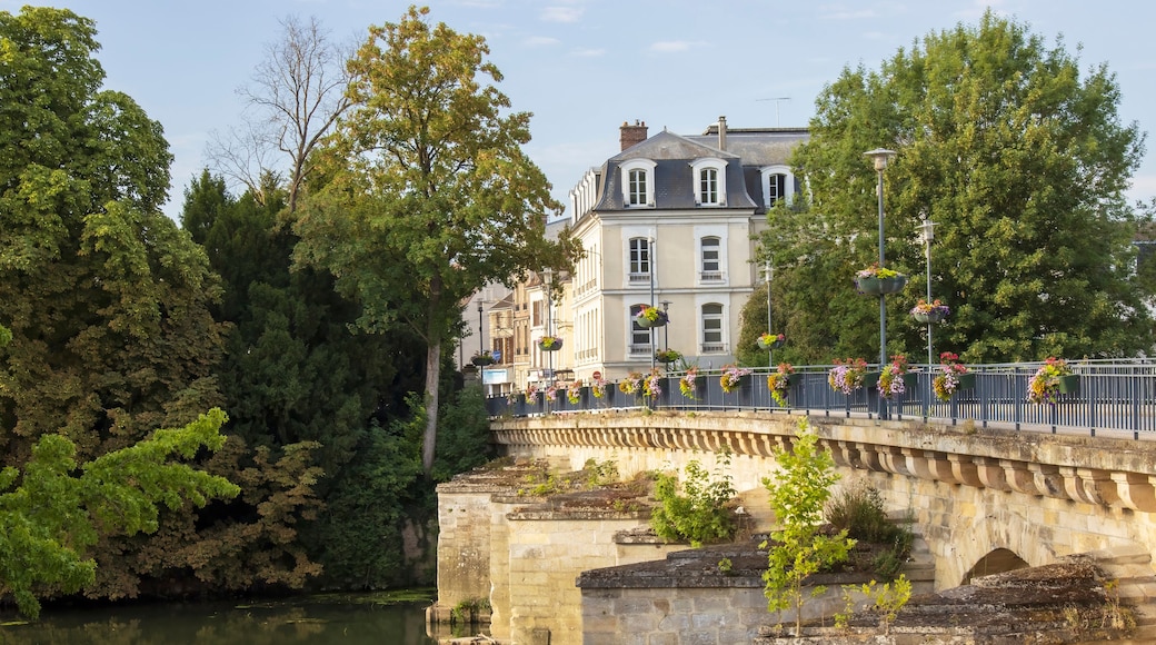 Meulan-en-Yvelines, France - Saturday 30th July 2022: Stone bridge over the river seine at Meulan-en-Yvelines