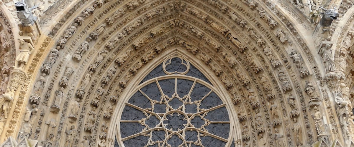 The front elevation of the ancient Reims Cathedral.