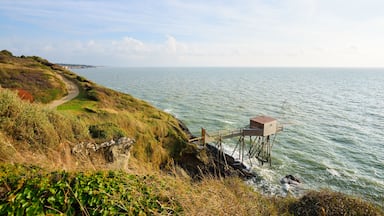 Large fishing net and a beautiful road in grassy dunes. Ocean landscape in Pornic, France.; Shutterstock ID 419394256; purchase_order: SP-1332 HA Batch 2 August 2018; Order: ; client: HomeAway; other: