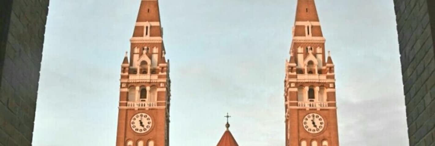This present day symbol of the town of Szeged was built as a promise after the great flood of 1879, which destroyed most of the city. The church is surrounded by a cloister with statues forming a national gallery.