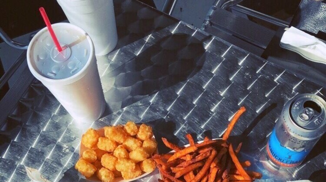 Where else can you sit outside in an enclosed porch and cover up with blankets while enjoying sliders and sweet potato fries? #GoodEats