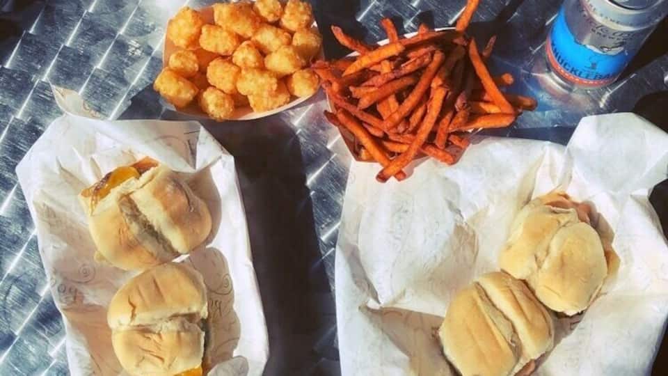 Where else can you sit outside in an enclosed porch and cover up with blankets while enjoying sliders and sweet potato fries? #GoodEats