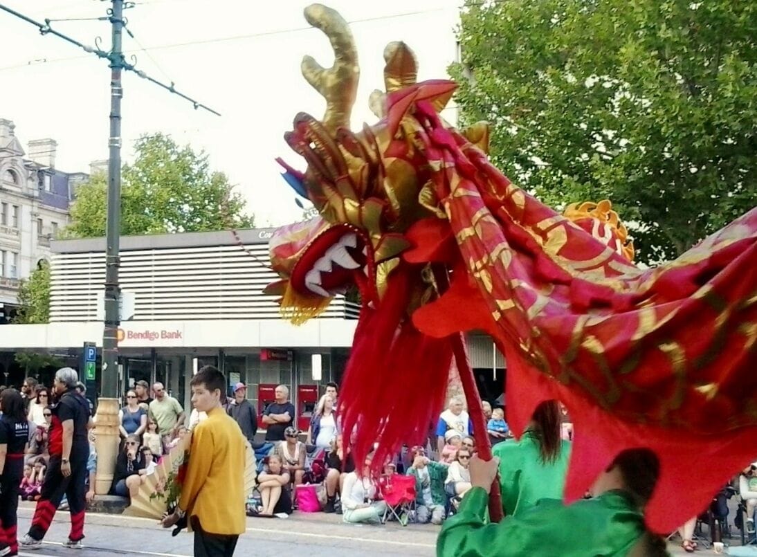 Bendigo Easter Sunday Parade (2013).  The Easter street parade seems go on enjoyably forever and features as a climax the world's longest imperial dragon.  It takes over 100 people to operate it.  This picture show one of many smaller dragons interspersed through the parade.  