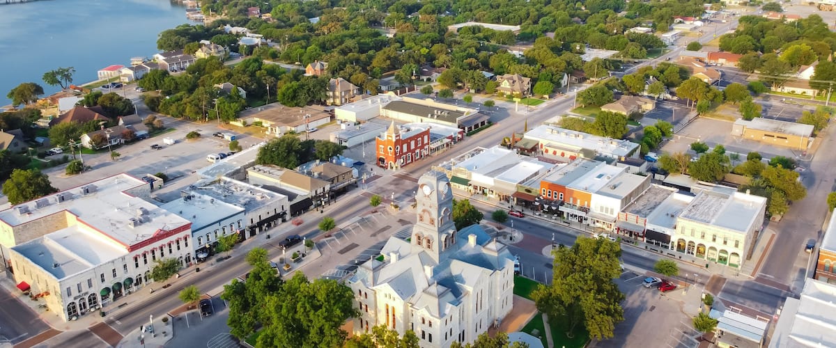 Aerial view Hood County Courthouse near Lake Granbury with unique boutique shops, restaurant in Texas, USA