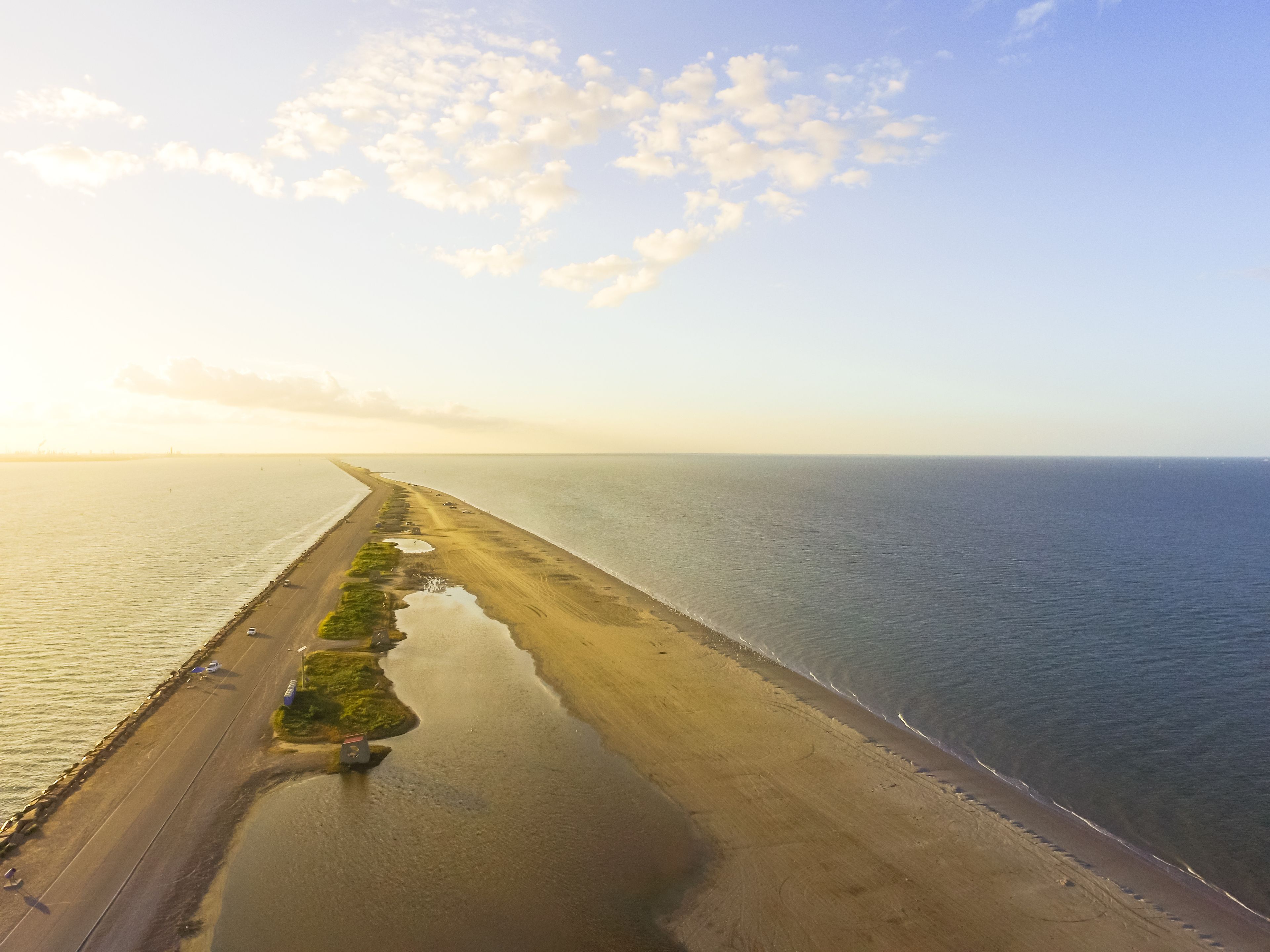 Aerial view famous Texas City Dike, a levee that projects nearly 5miles south-east into mouth of Galveston Bay. It was designed to reduce the impact of sediment accumulation along the lower Bay