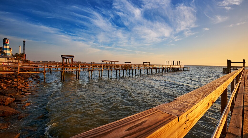 Line of wooden docks into Galveston Bay