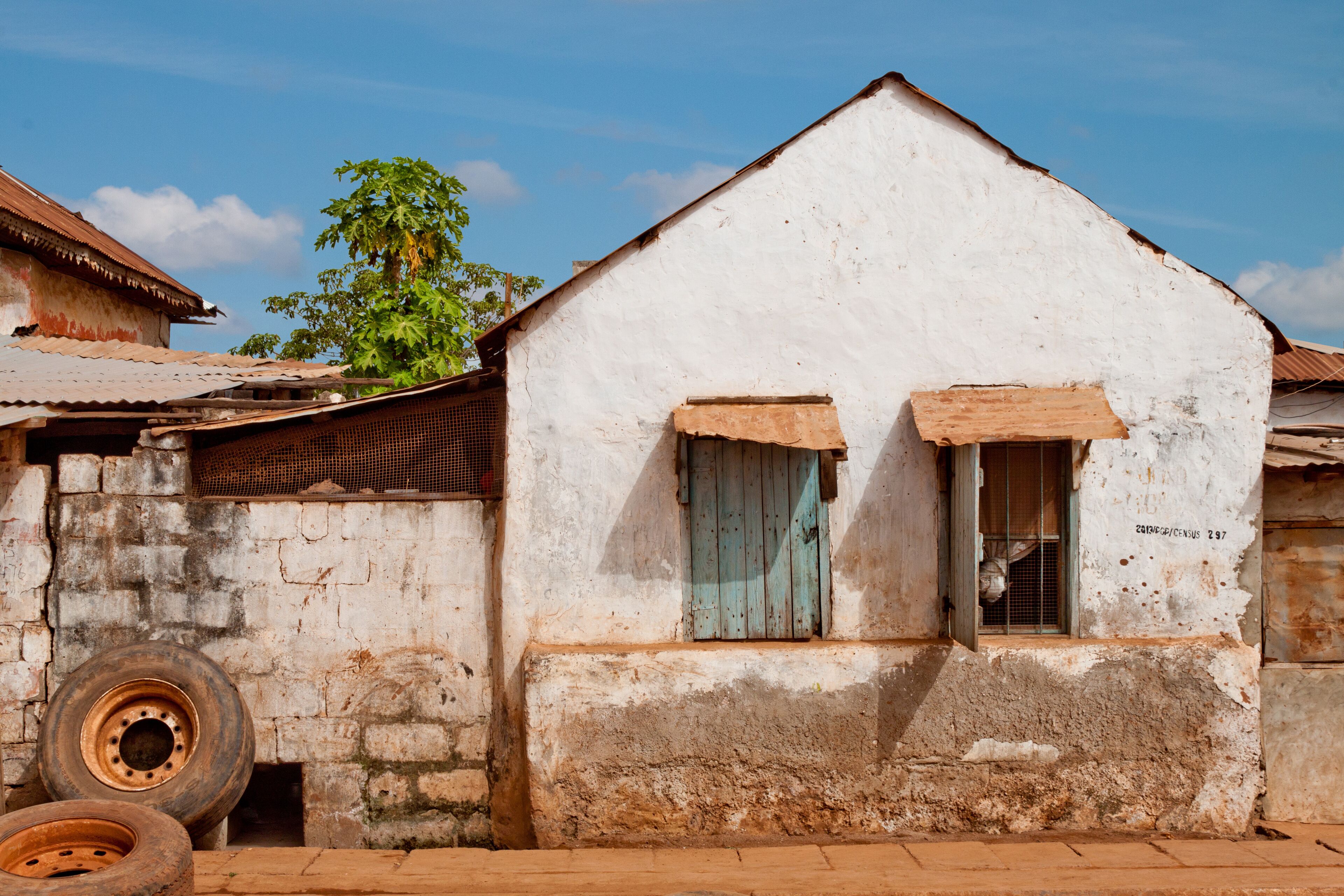 A stone building marked for the 2013 census in Banjul, the Gambia