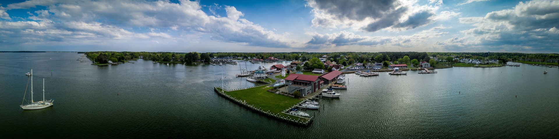 Aerial panorama of shipyard and lighthouse in St. Michaels harbor in Maryland in the Chesapeake Bay