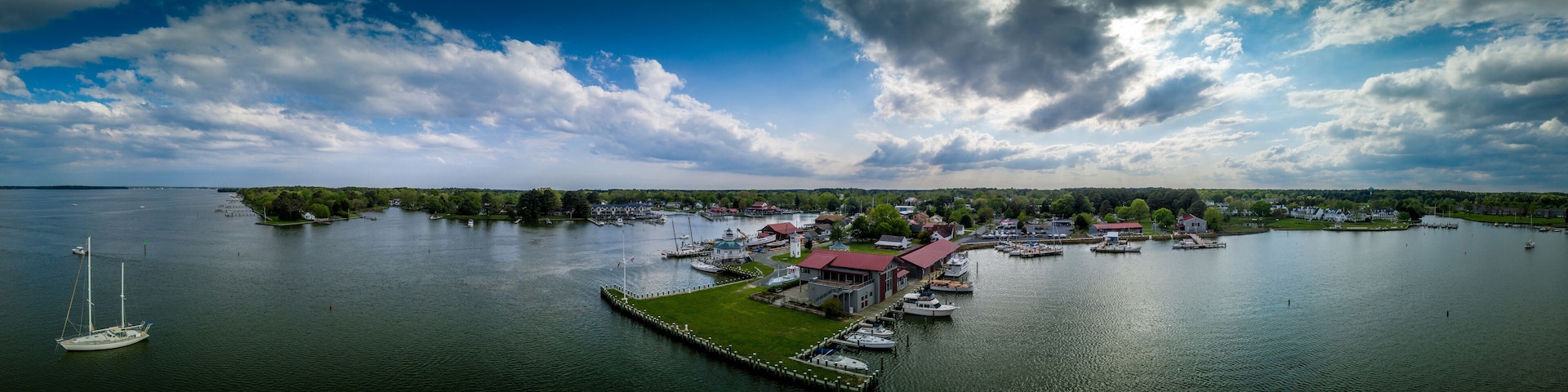 Aerial panorama of shipyard and lighthouse in St. Michaels harbor in Maryland in the Chesapeake Bay
