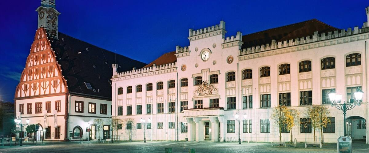 A historic building with a clock tower and a traditional facade.
