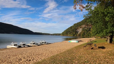 Beautiful Wisconsin nature background. Scenic view with boats and catamarans on a lake beach. Devils Lake State Park south shore, Baraboo area, Wisconsin, Midwest USA.