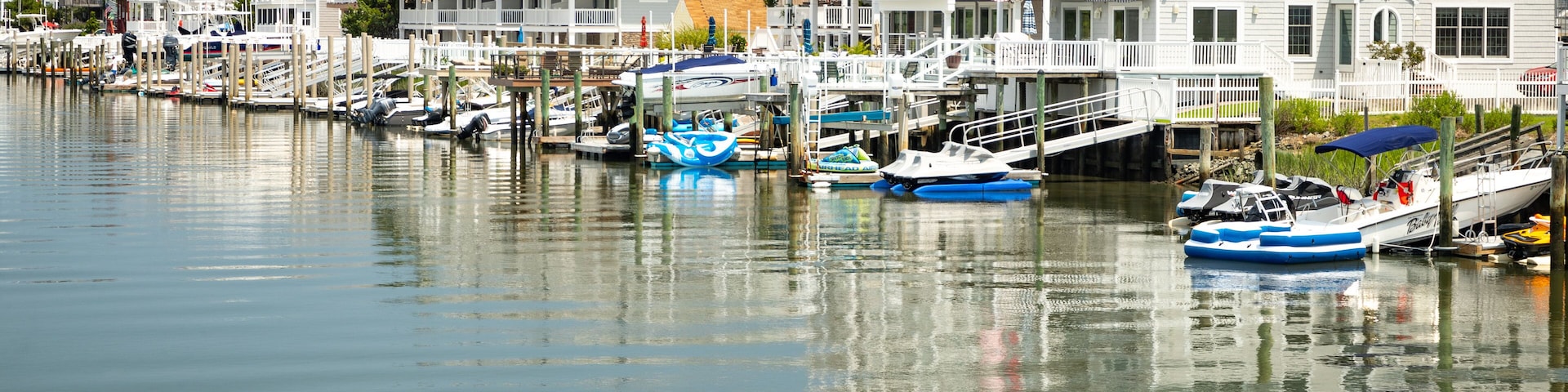 Avalon which includes a bay or harbor and a house