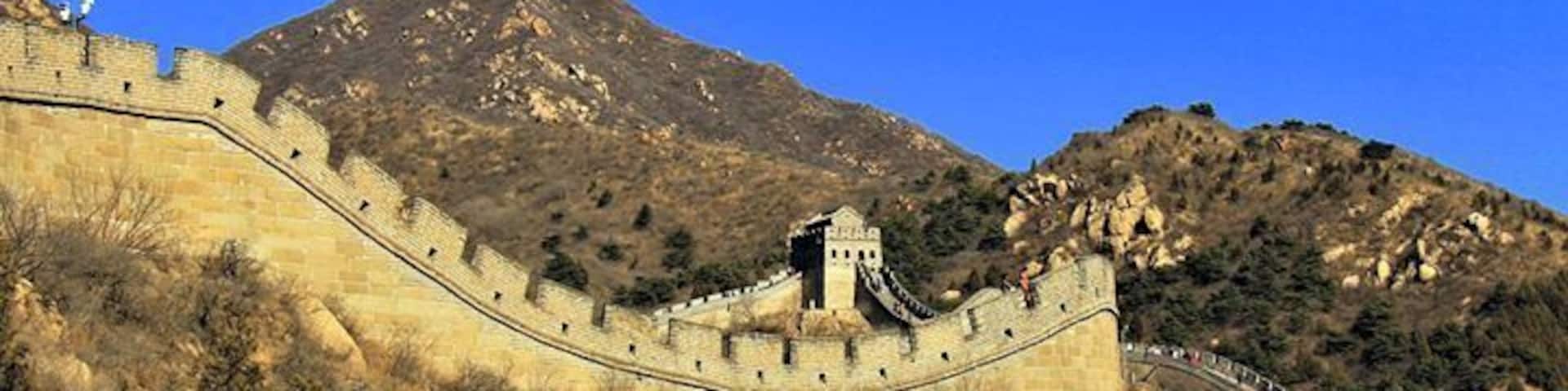 The Great Wall of China winding through a mountainous landscape.