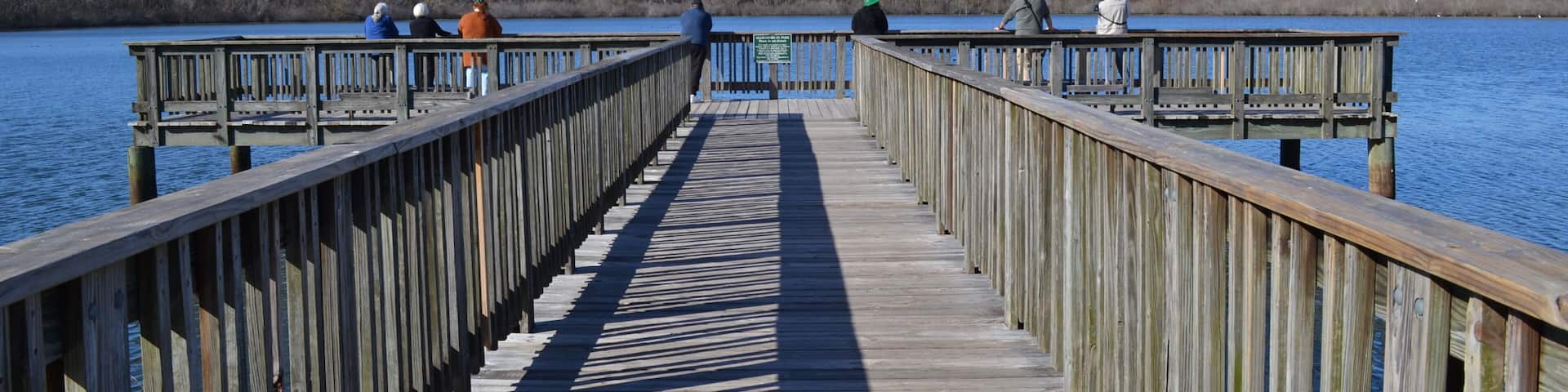 People on the fishing pier, White Lake, Cullinan Park Conservatory, Sugar Land, Texas