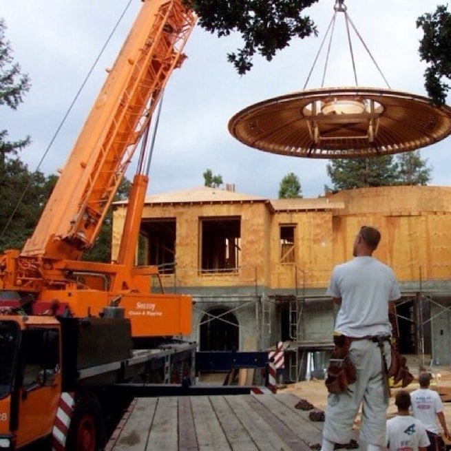 Placing a dome above a rotunda built front entry. Using the crane and having the dome hover over our heads, it seemed to resemble a flying saucer landing. Very hard work completed by Lencioni Construction and I.