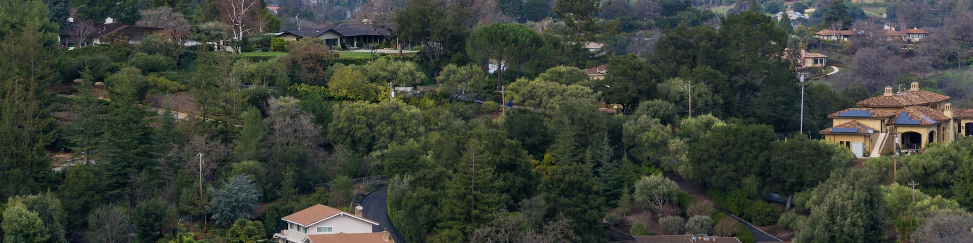 Panoramic view of the Peninsula on a cloudy day; view towards Los Altos, Palo Alto, Menlo Park, Silicon Valley and Dumbarton Bridge and San Francisco in the background, San Francisco bay, California
