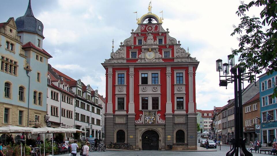 A historic building with ornate architecture and a clock tower.
