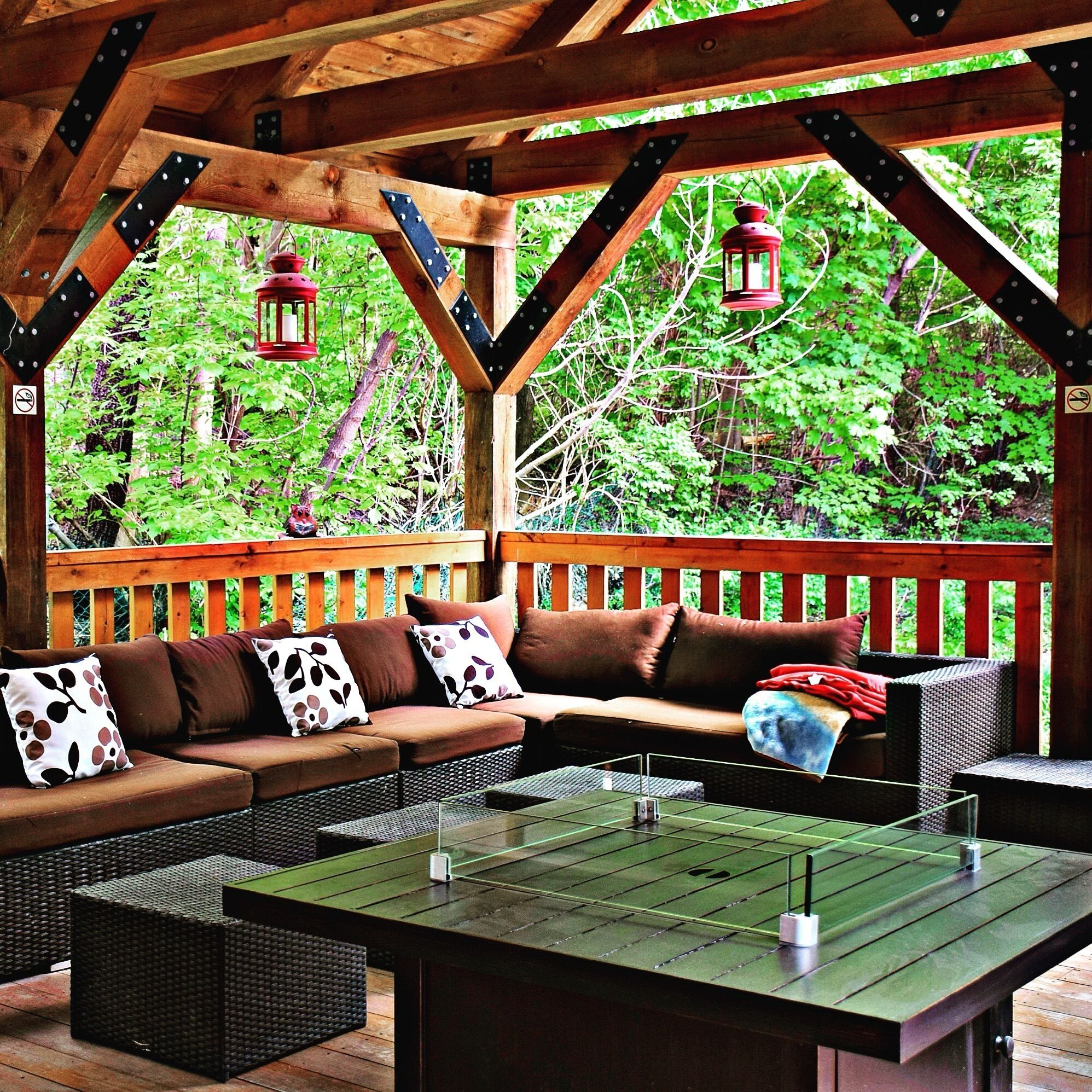 The beautiful deck at the Siberian Cat Cafe looks like a secret hideaway in the woods.  Inside, beautiful Siberian cats to visit, which don't bother most people with allergies.  It's the world's first hypoallergenic cat cafe!