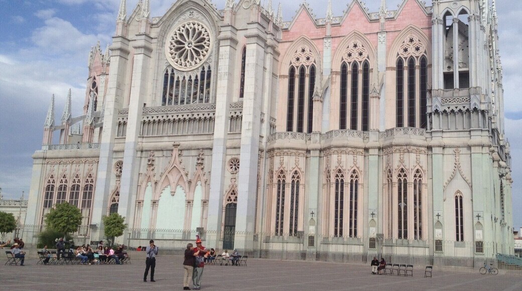 Leon's pastel church with people dancing.