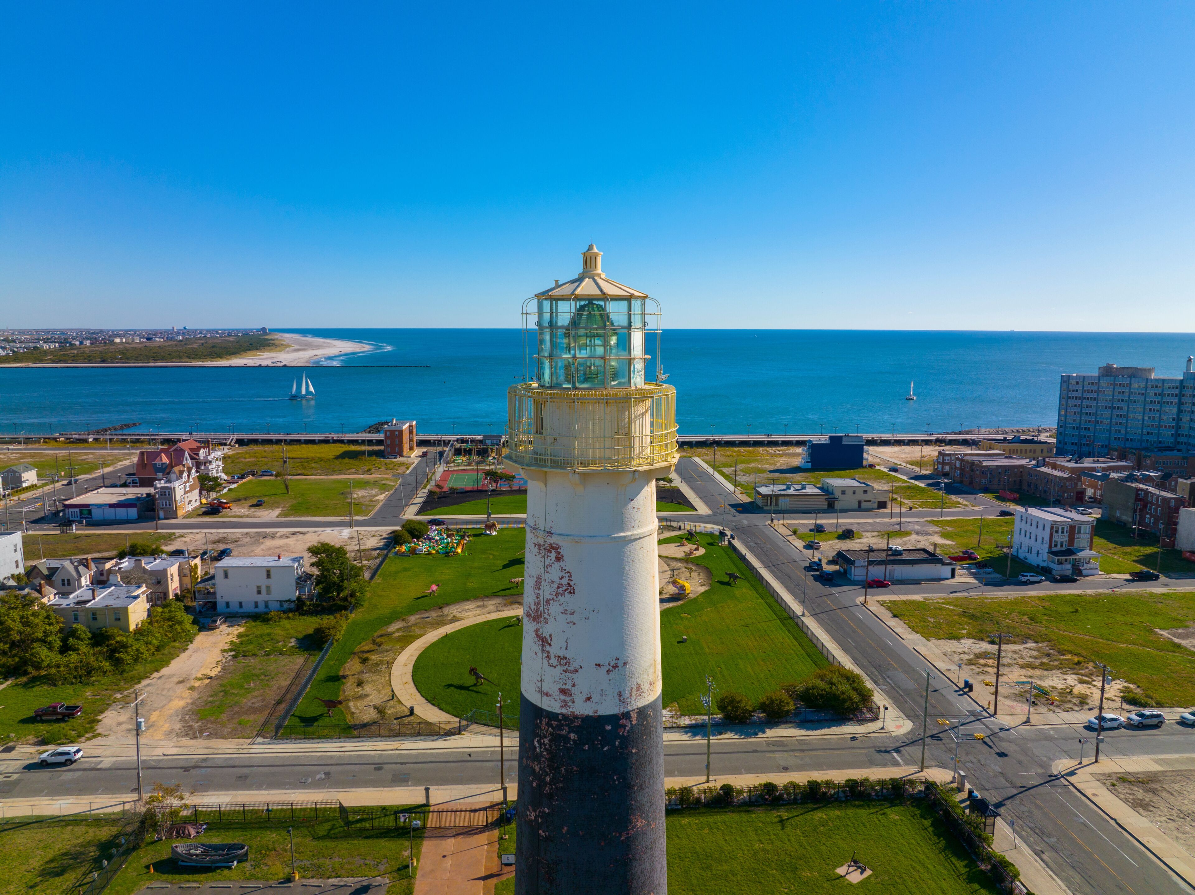 Absecon Lighthouse aerial view at the mouth of Absecon Inlet in the north end of Atlantic City, New Jersey NJ, USA. The light house was built in 1856 and is the tallest Lighthouse in New Jersey. 