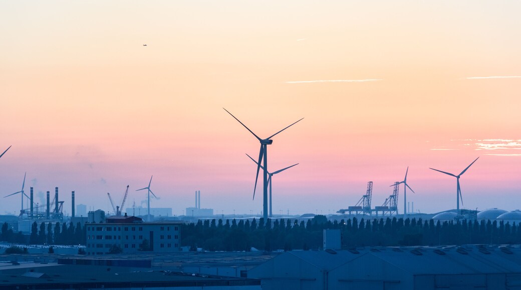 Detail of the west port - Westpoort of Amsterdam and eolic generators at dusk.