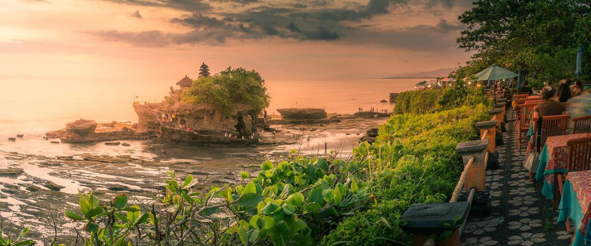 View of Tanah Lot, traditional Balinese temple at sunset, Beraban, Kediri, Tabanan Regency, Bali