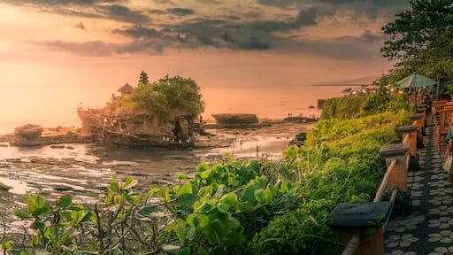 View of Tanah Lot, traditional Balinese temple at sunset, Beraban, Kediri, Tabanan Regency, Bali