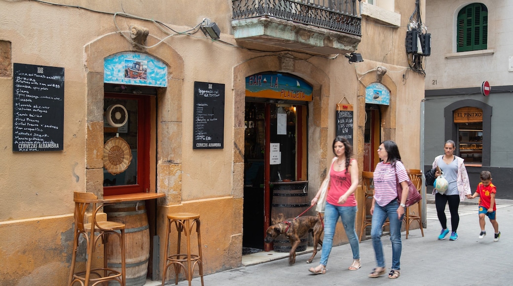 Barceloneta which includes street scenes as well as a small group of people